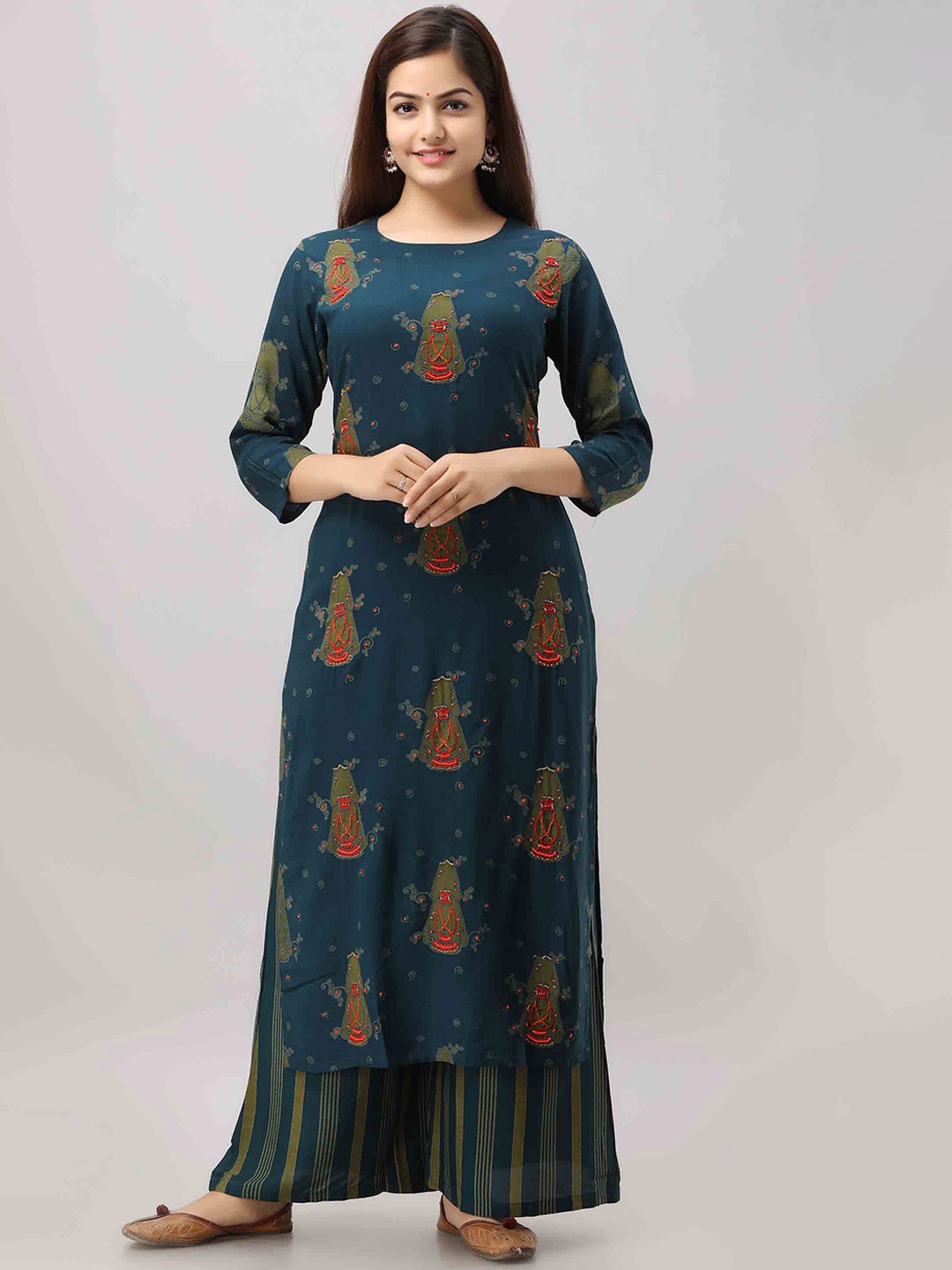 

KALINI Women Green Embroidered Thread Work Kurta with Palazzos