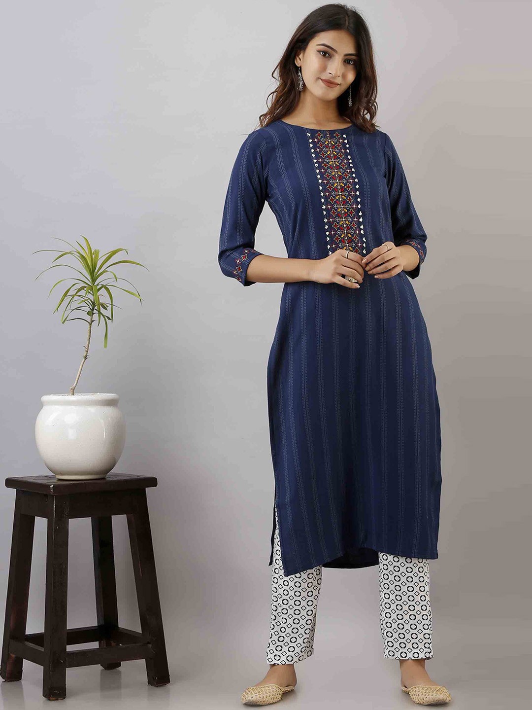 

KALINI Women Blue Embroidered Panelled Kantha Work Kurti with Trousers