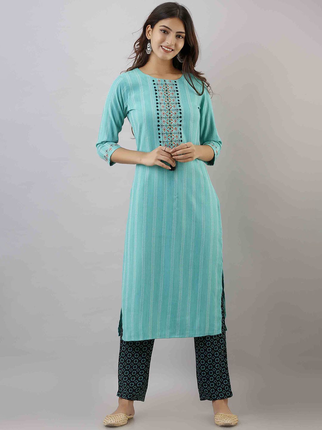 

KALINI Women Turquoise Blue Embroidered High Slit Kantha Work Kurta with Trouser