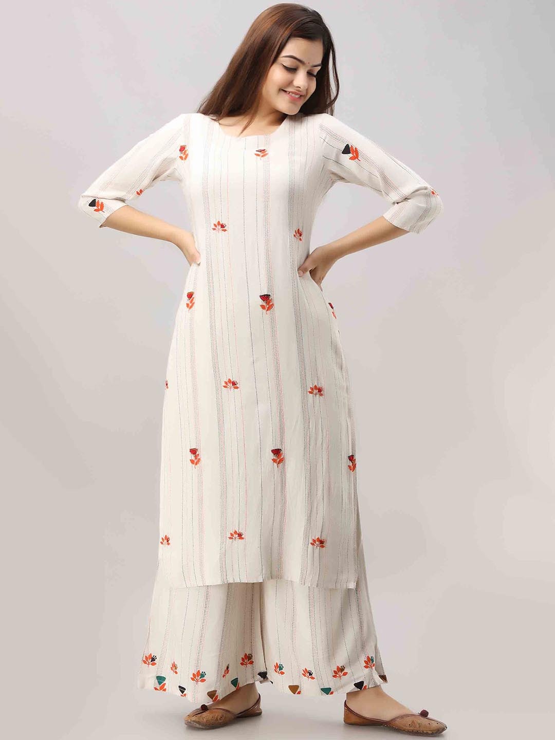 

KALINI Women White Embroidered Thread Work Kurta with Palazzo