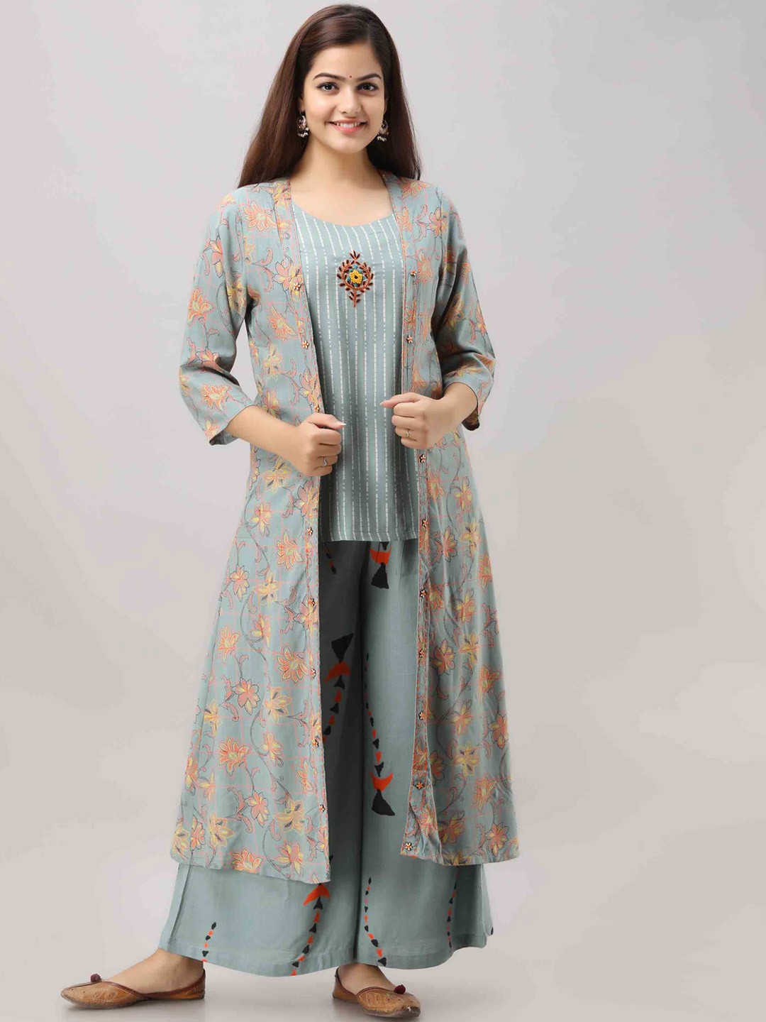 

KALINI Women Blue Floral Embroidered Thread Work Kurti with Palazzos