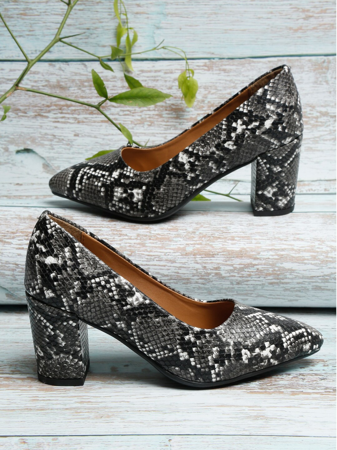 

Bruno Manetti Black Animal Skin Print PU Block Pump Heels