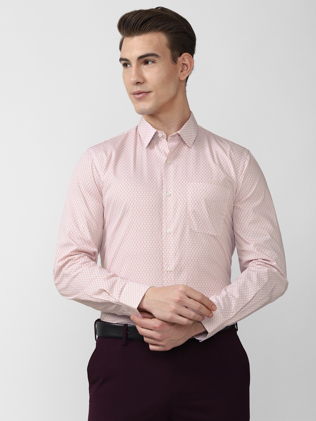 

Peter England Men Peach-Coloured Solid Slim Fit Formal Shirt