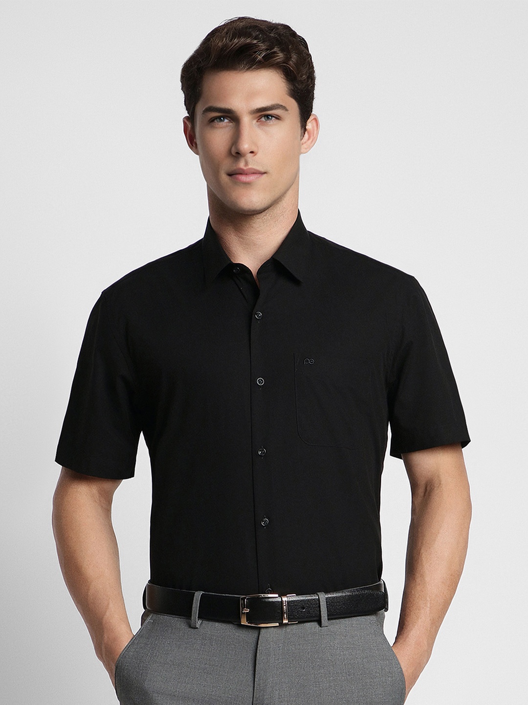 

Peter England Men Black Solid Formal Shirt