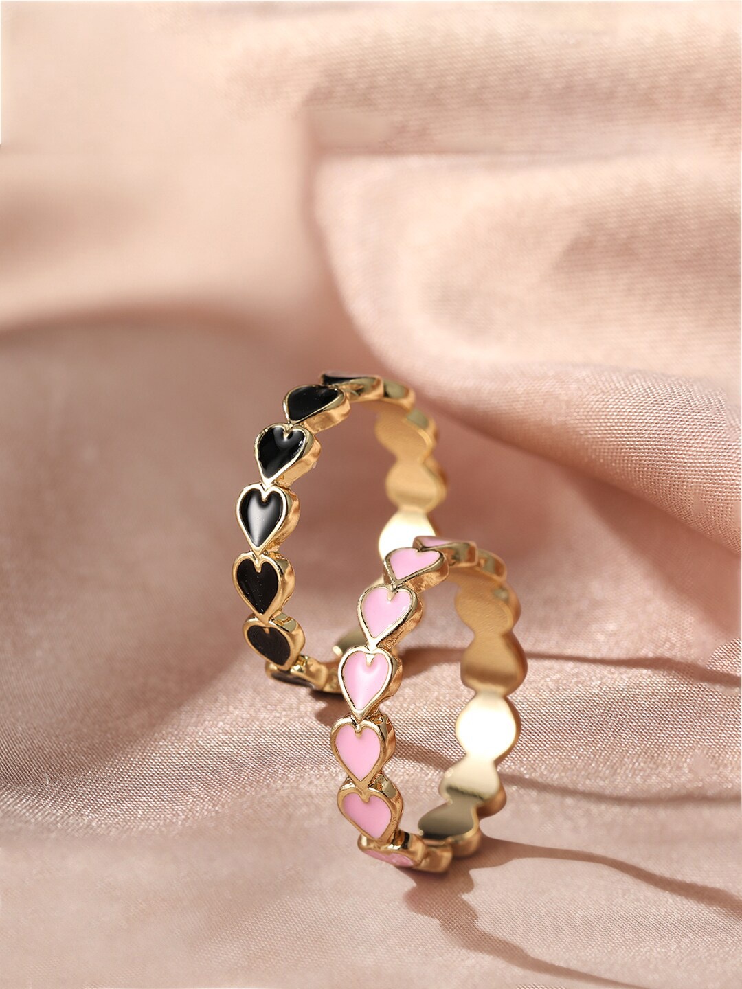 

Yellow Chimes Gold-Plated Set Of 2 Black and Pink Heart Shape Designed Rings