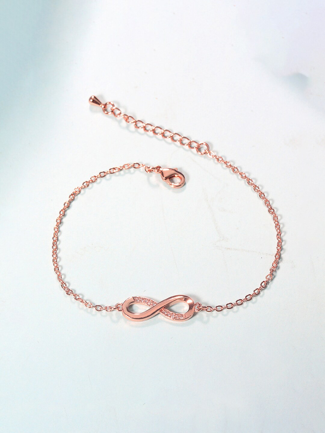 

Yellow Chimes Women Gold Toned Infinity Shape Crystal Studded Charming Bracelet, White