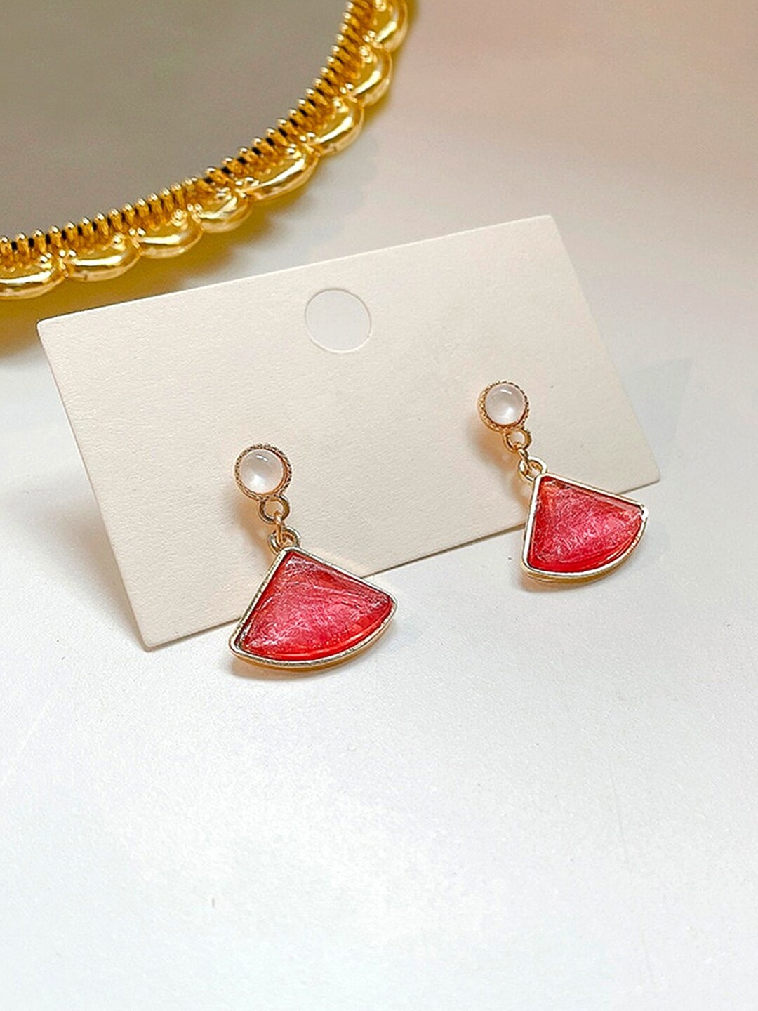 

Yellow Chimes Pink Gold-Plated Triangle Shaped Crystal Studded Drop Earrings