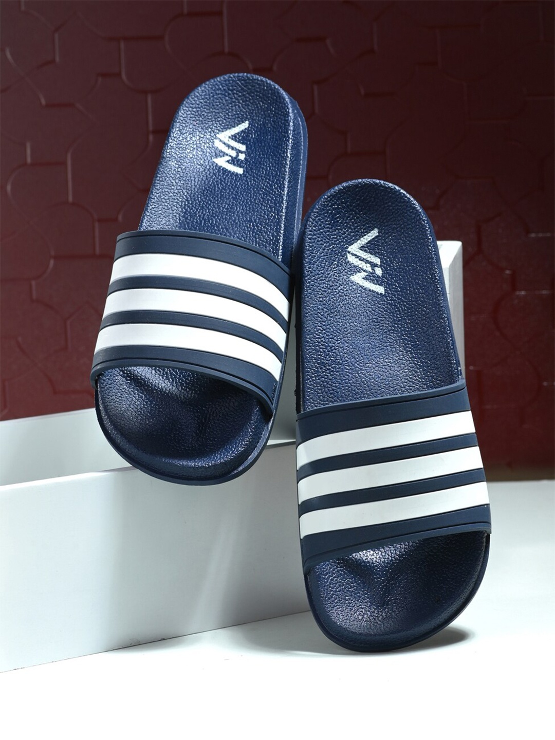 

VIV Men Blue & White Striped Rubber Sliders