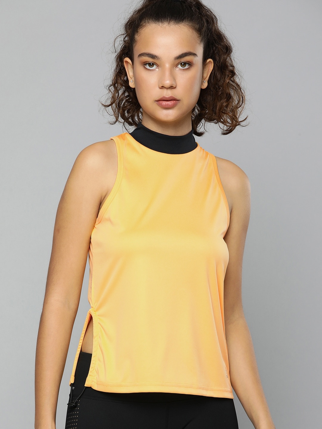 

HRX by Hrithik Roshan Mustard Yellow Solid Training Top