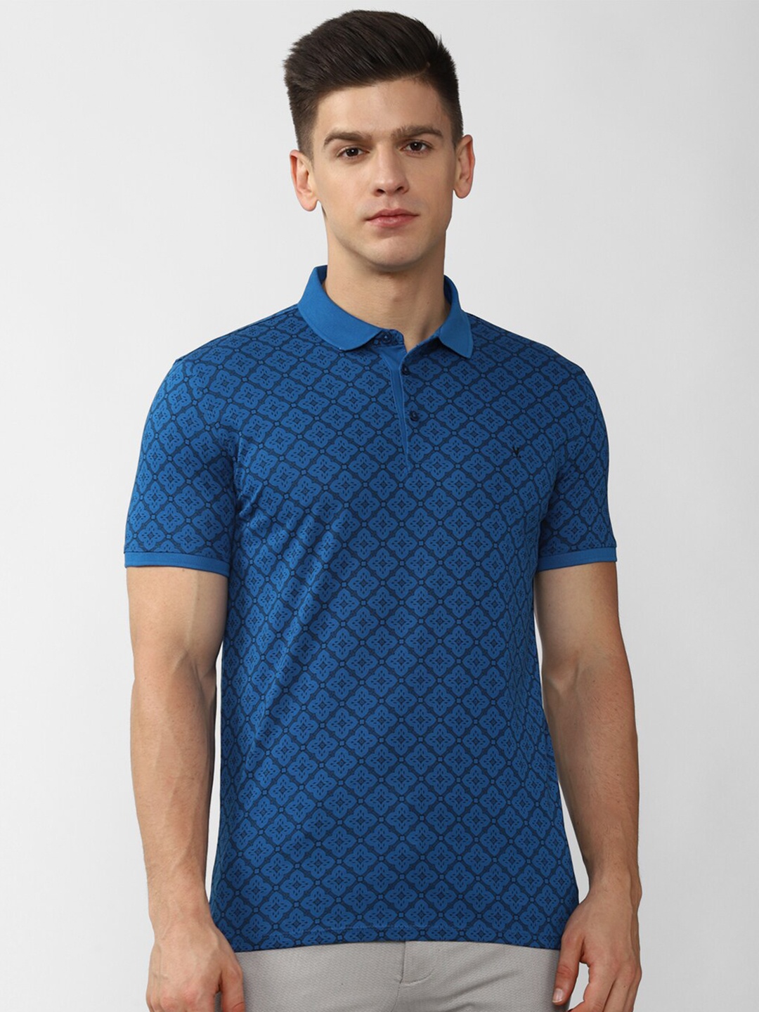 

V Dot Men Blue Printed Polo Collar Slim Fit T-shirt