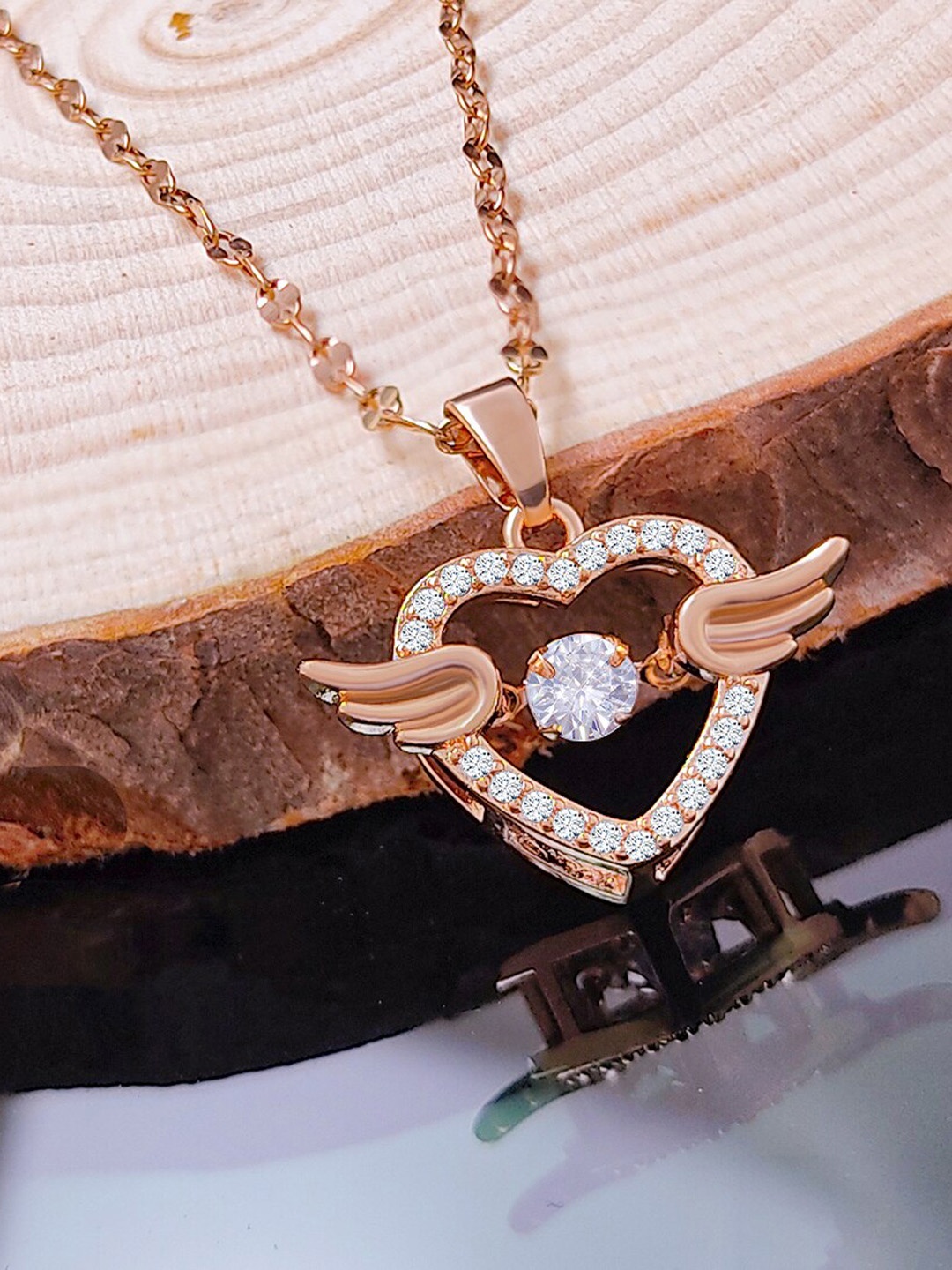 

Saizen Rose Gold-Plated American Diamond Pendant With Chain