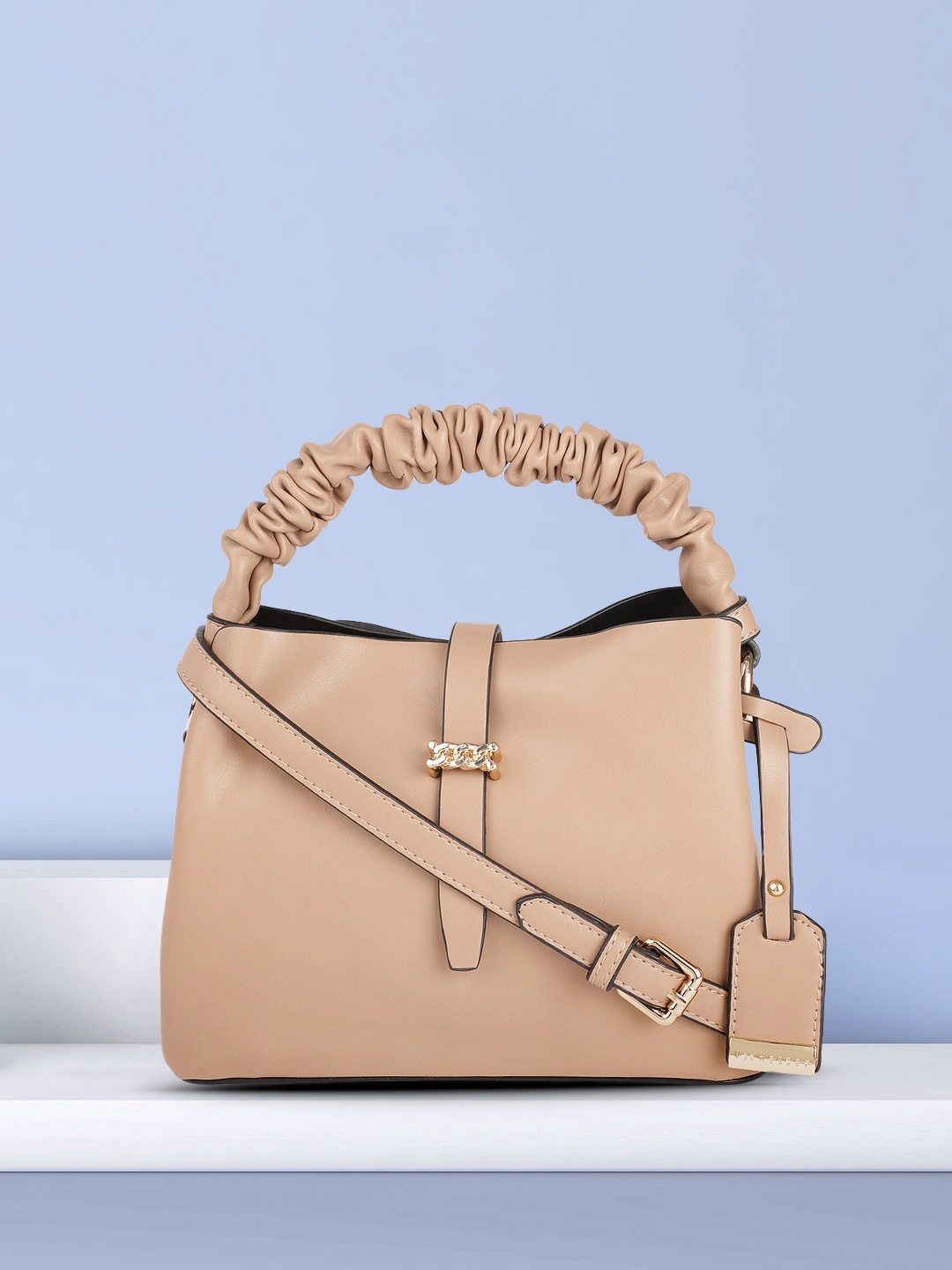 

Van Heusen Beige Solid Handheld Bag