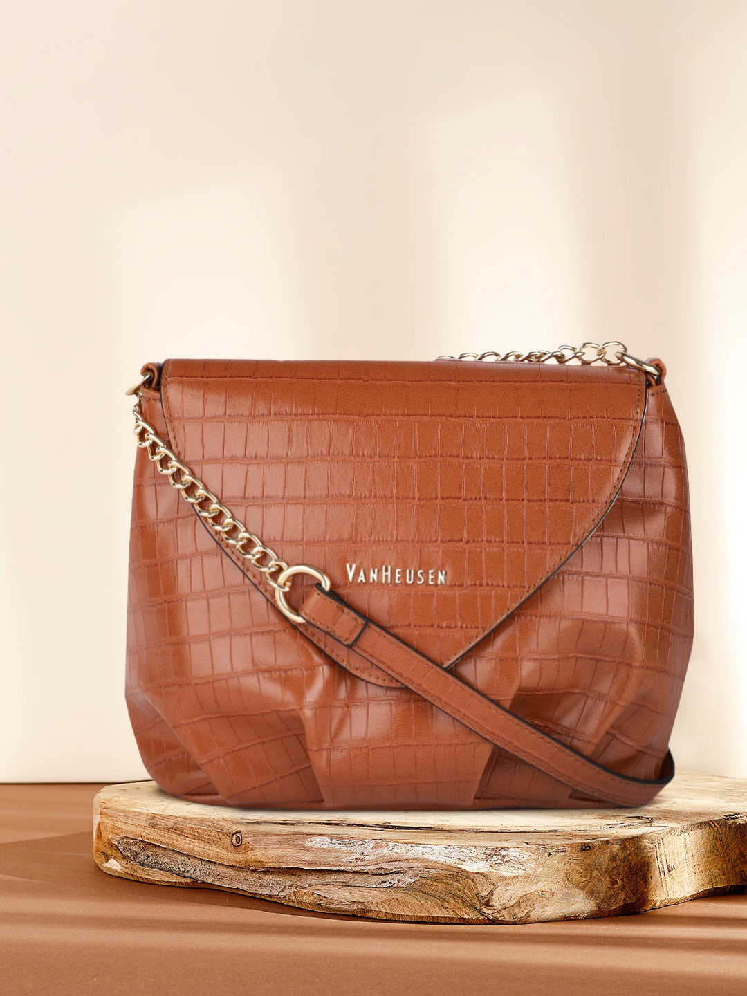 

Van Heusen Tan Brown Textured Sling Bag