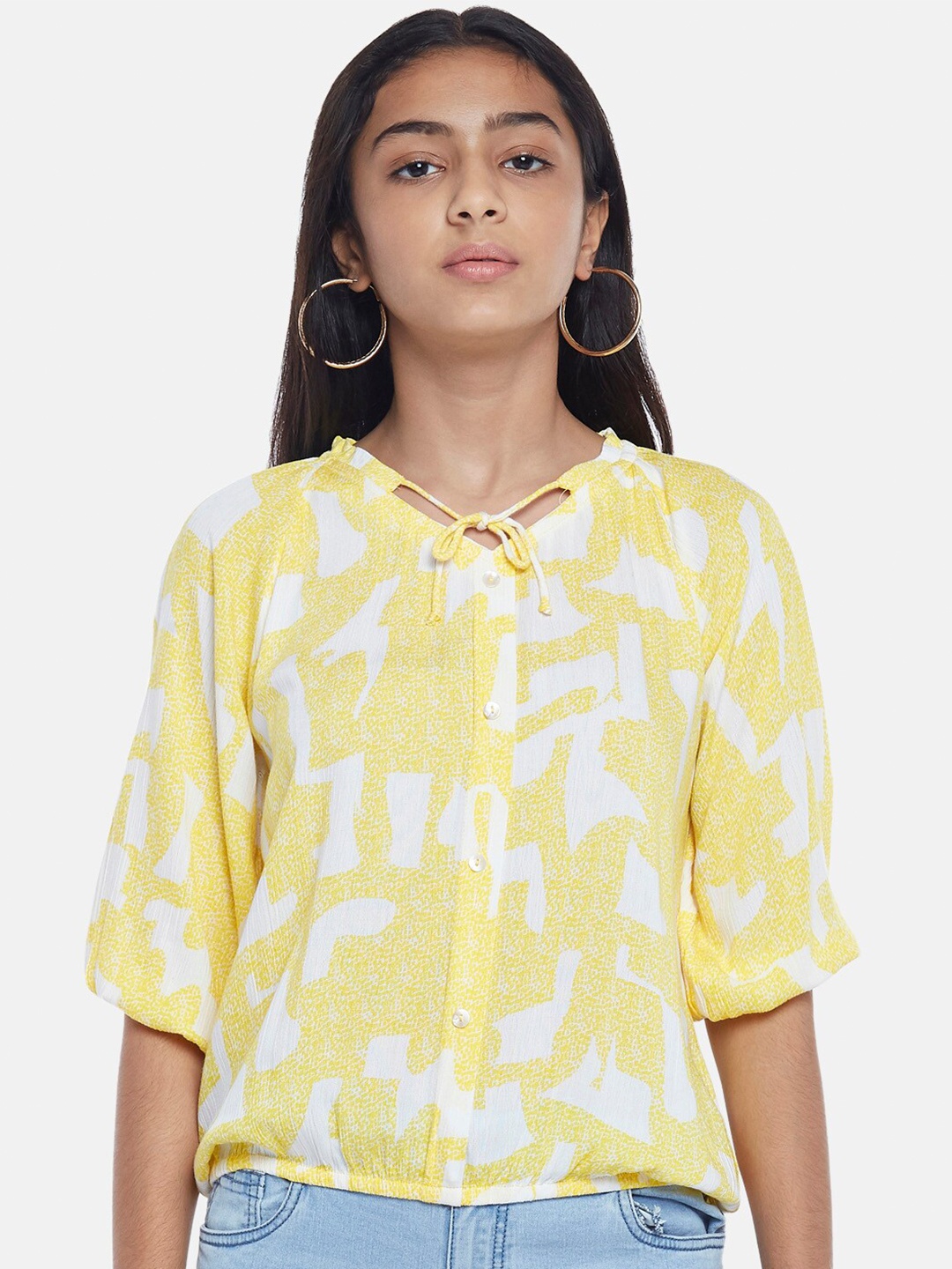 

Coolsters by Pantaloons Yellow & White Print Tie-Up Neck Top