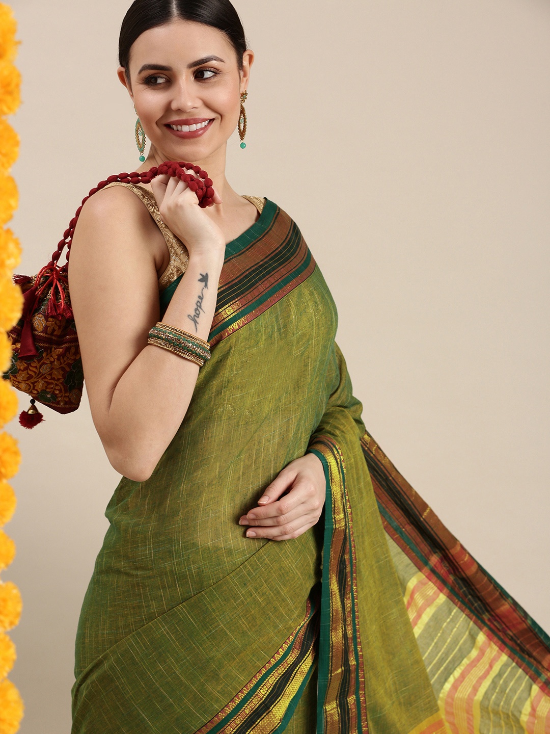 

KALINI Green Solid Pure Cotton Paithani Saree