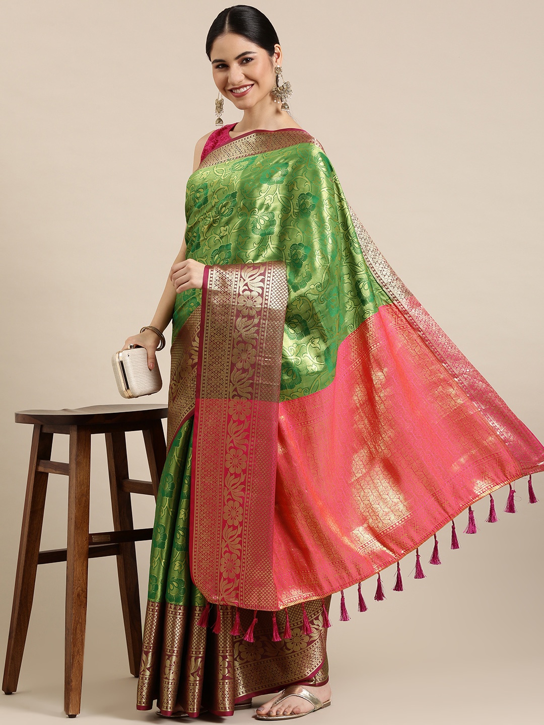 

Mitera Green & Golden Ethnic Motifs Zari Silk Blend Banarasi Saree