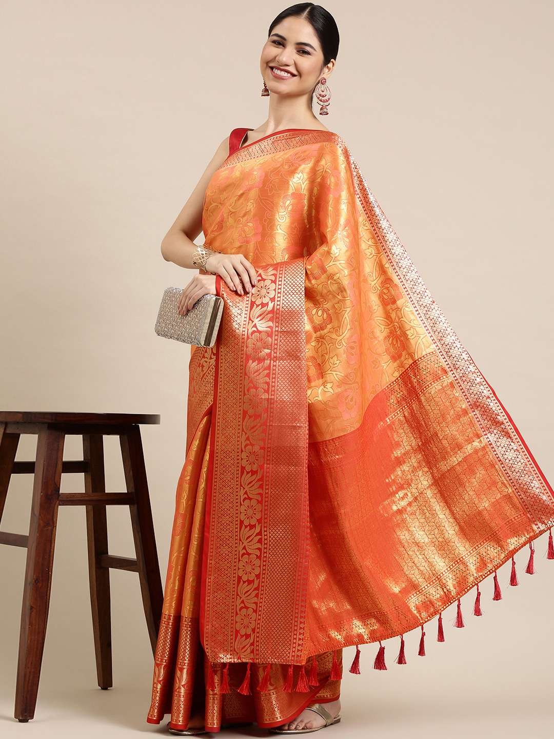 

Mitera Peach-Coloured & Golden Ethnic Motifs Zari Silk Blend Banarasi Saree