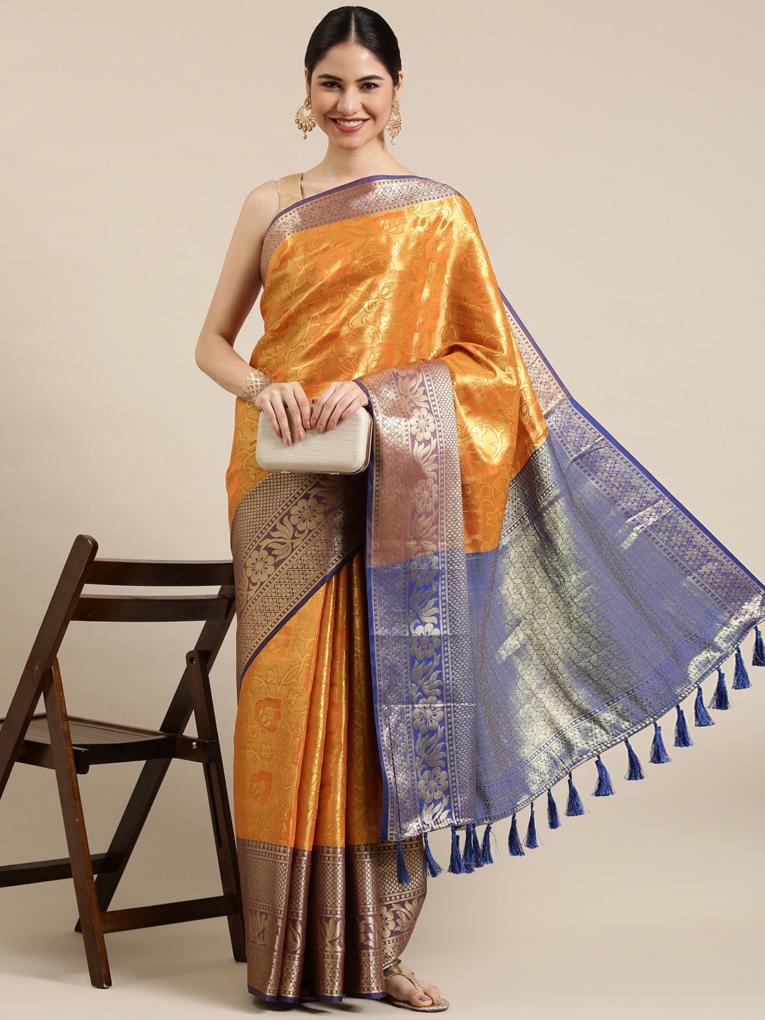 

Mitera Mustard & Purple Ethnic Motifs Zari Silk Blend Banarasi Saree