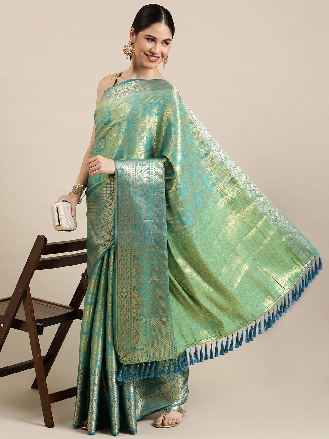 

Mitera Green Ethnic Motifs Zari Silk Blend Banarasi Saree