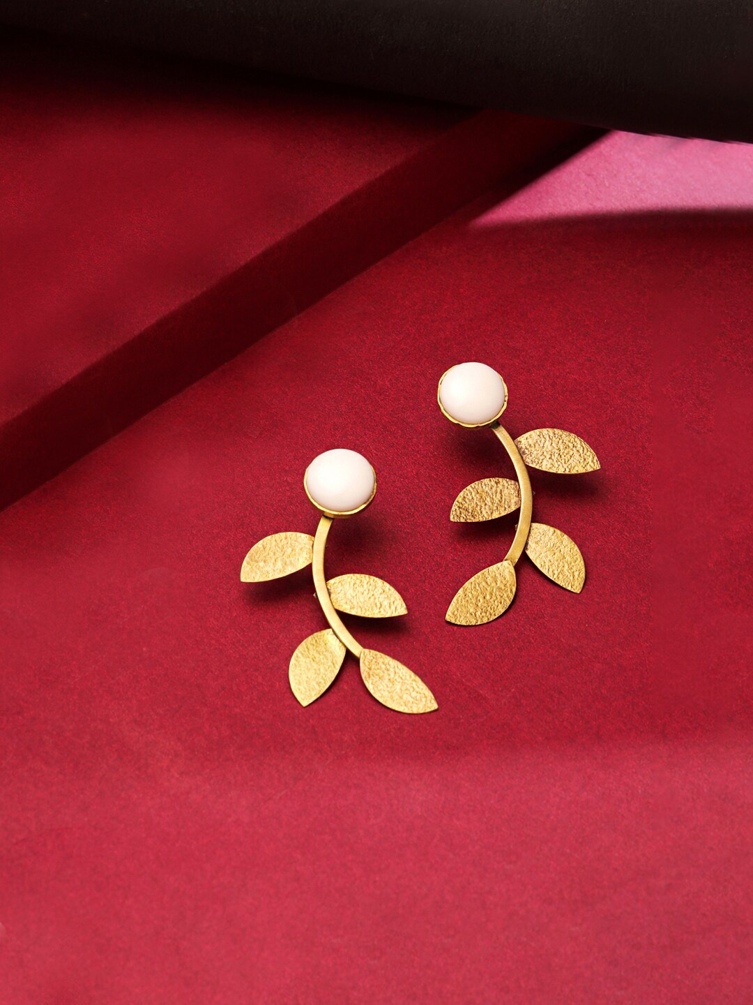 

Yellow Chimes White Gold Plated Leaf Shaped Studs Earrings