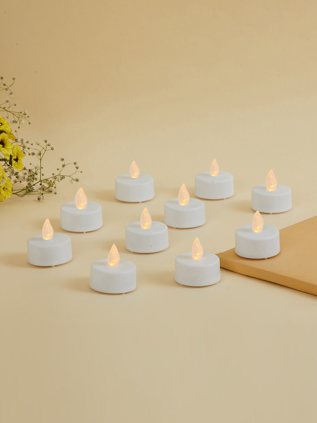 

Home Centre White Set Of 10 Serena Delight White Solid LED Flameless Tealights