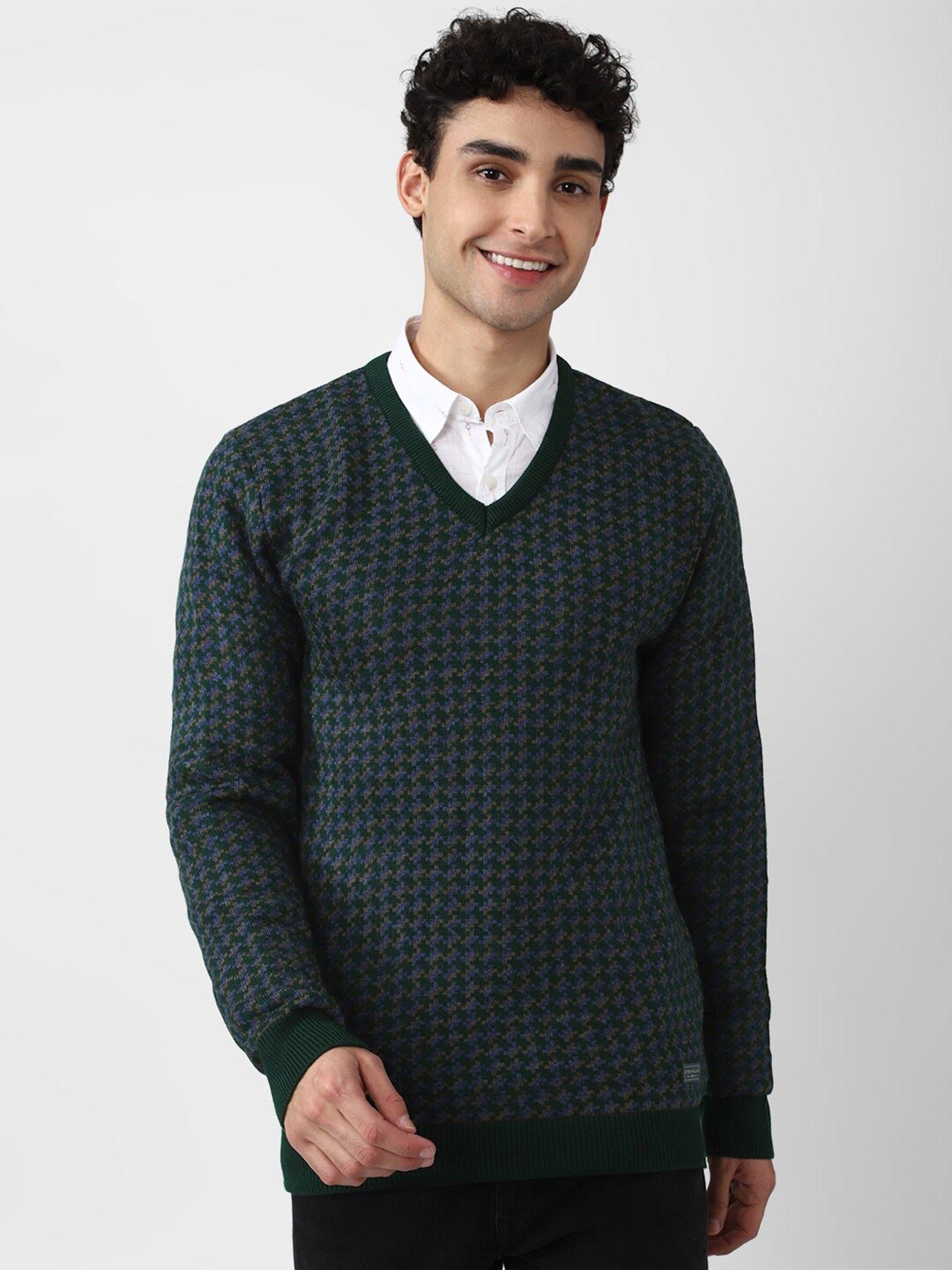 

Peter England Casuals Men Navy Blue Self Design Acrylic V-Neck Pullover