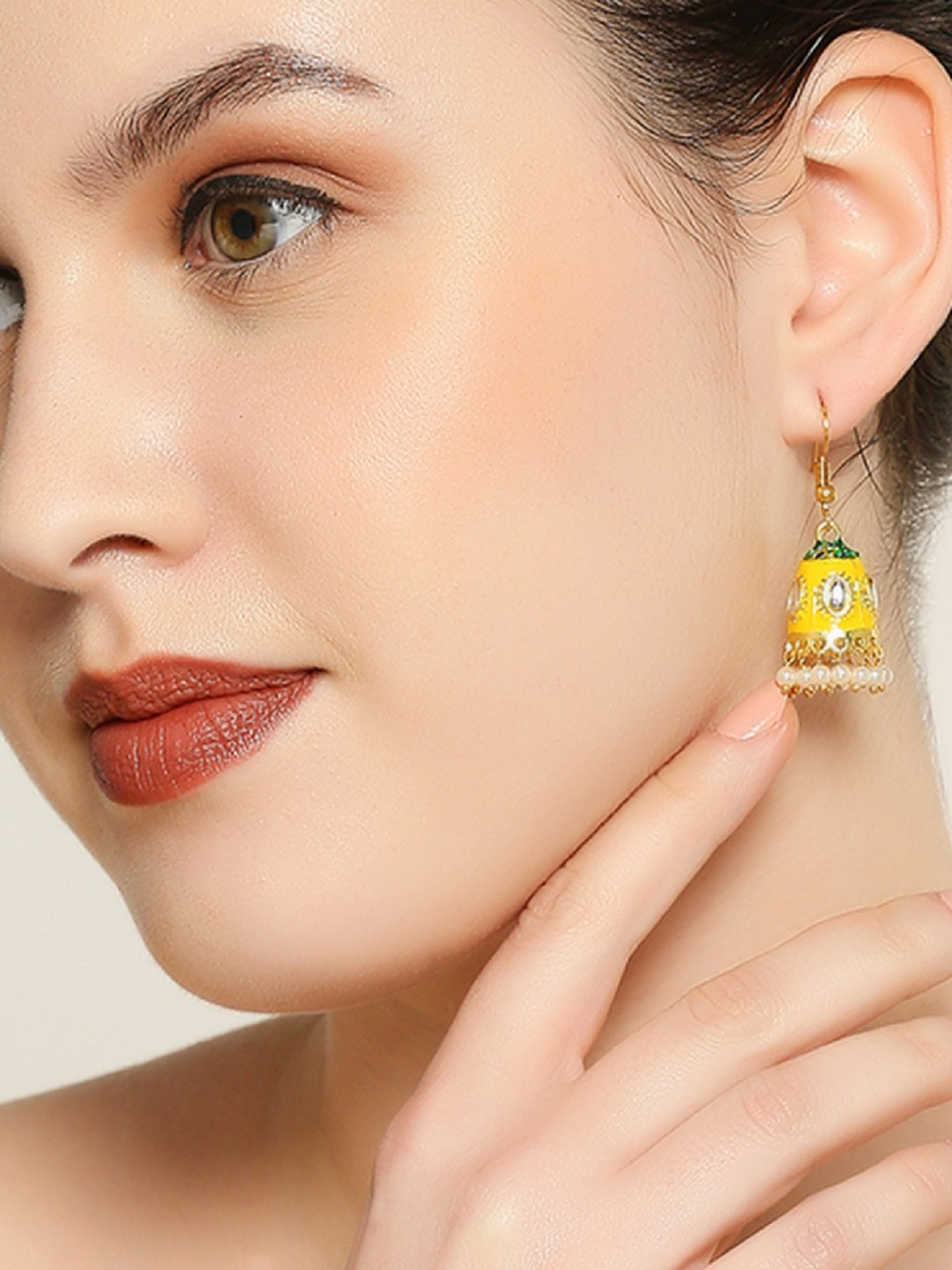 

OOMPH Yellow & Green Dome Shaped Kundan Jhumkas Earrings