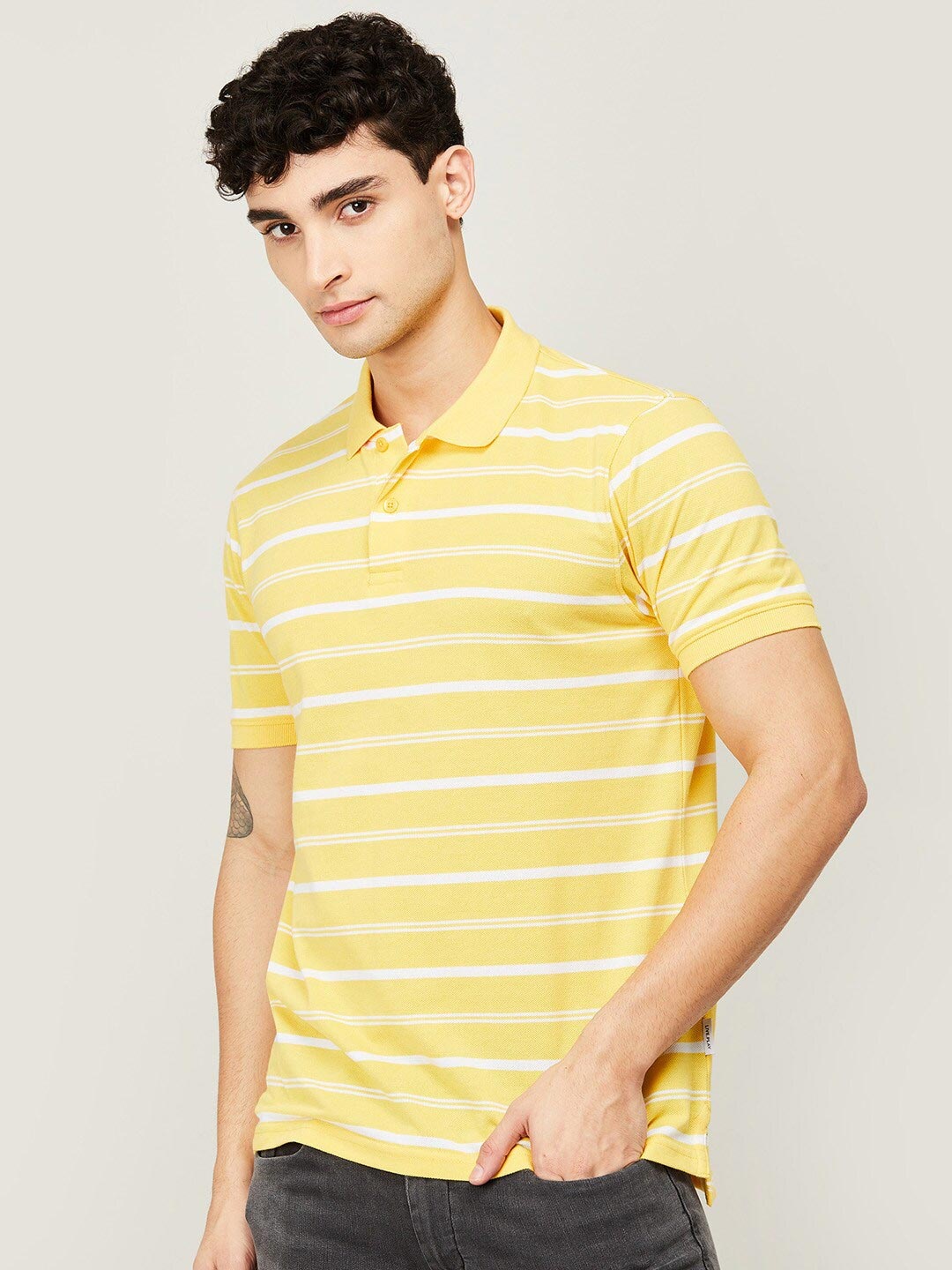 

Fame Forever by Lifestyle Men Yellow & White Striped Polo Collar T-shirt