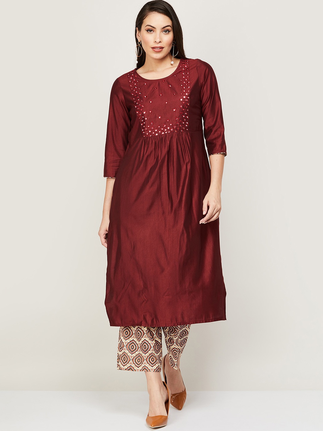 

Melange by Lifestyle Women Red Embroidered Pleated Kurti with Trousers