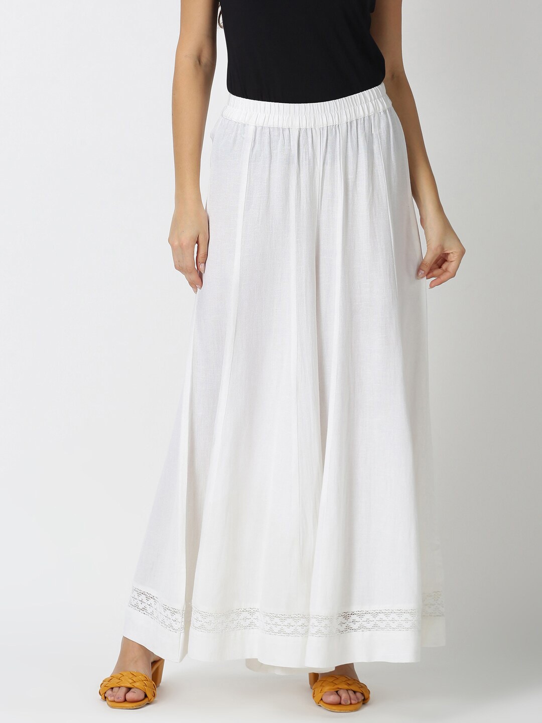 

Saffron Threads Women White Flared Ethnic Palazzo with Lace on Hem
