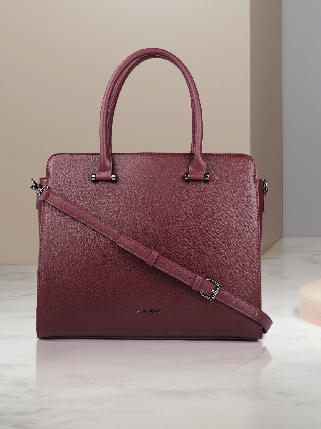 

Allen Solly Women Burgundy Solid Structured Handheld Bag