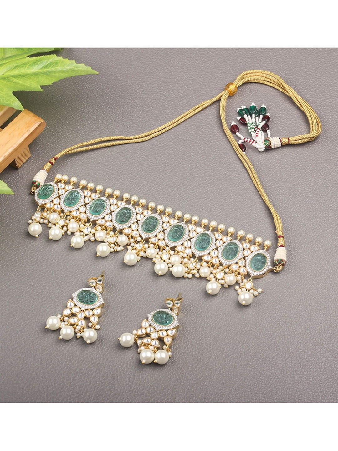 

AURAA TRENDS Gold-Plated & Turquoise Blue Kundan Studded Jewellery Set