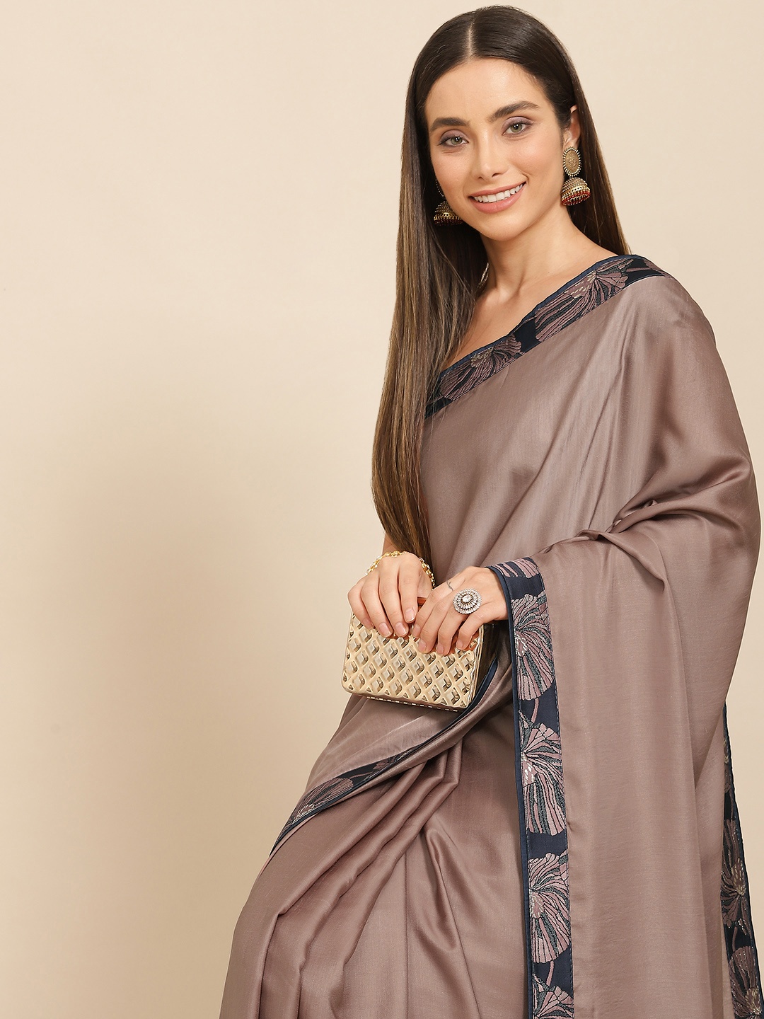 

Nimayaa Brown Solid Satin Saree