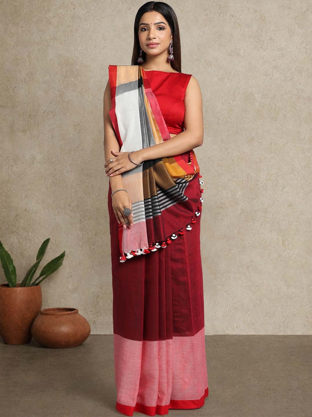 

ArtEastri Maroon & Orange Colourblocked Pure Cotton Taant Saree