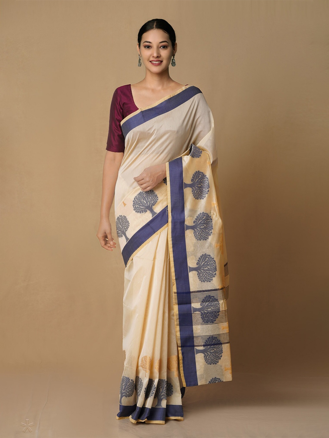 

Unnati Silks Cream-Coloured & Blue Woven Design Zari Silk Cotton Baluchari Saree