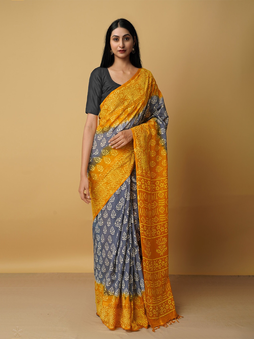 

Unnati Silks Grey & White Ethnic Motifs Zari Silk Blend Baluchari Saree