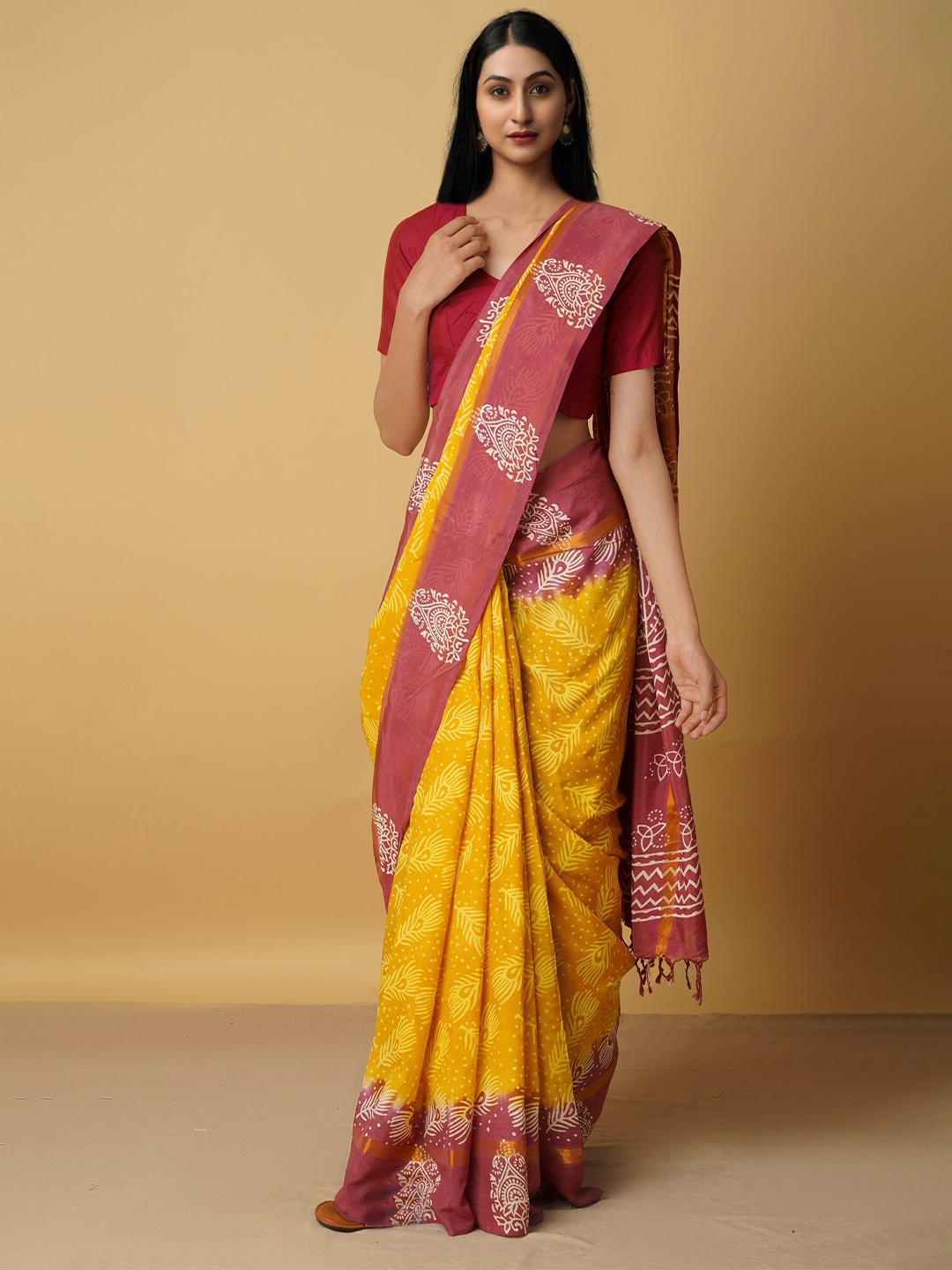 

Unnati Silks Yellow & Maroon Floral Silk Blend Baluchari Saree