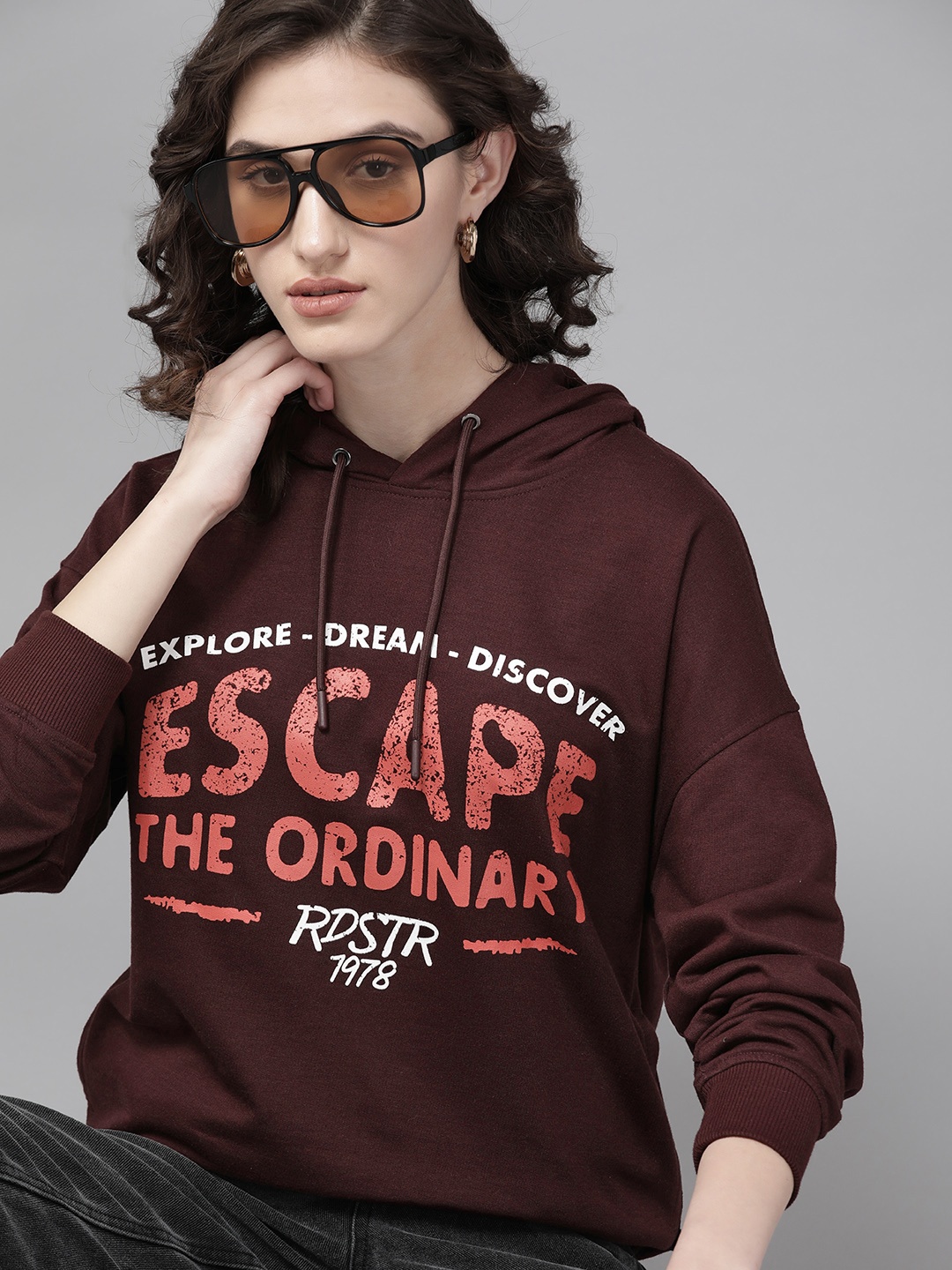 

The Roadster Lifestyle Co. Women Burgundy Printed Hooded Sweatshirt