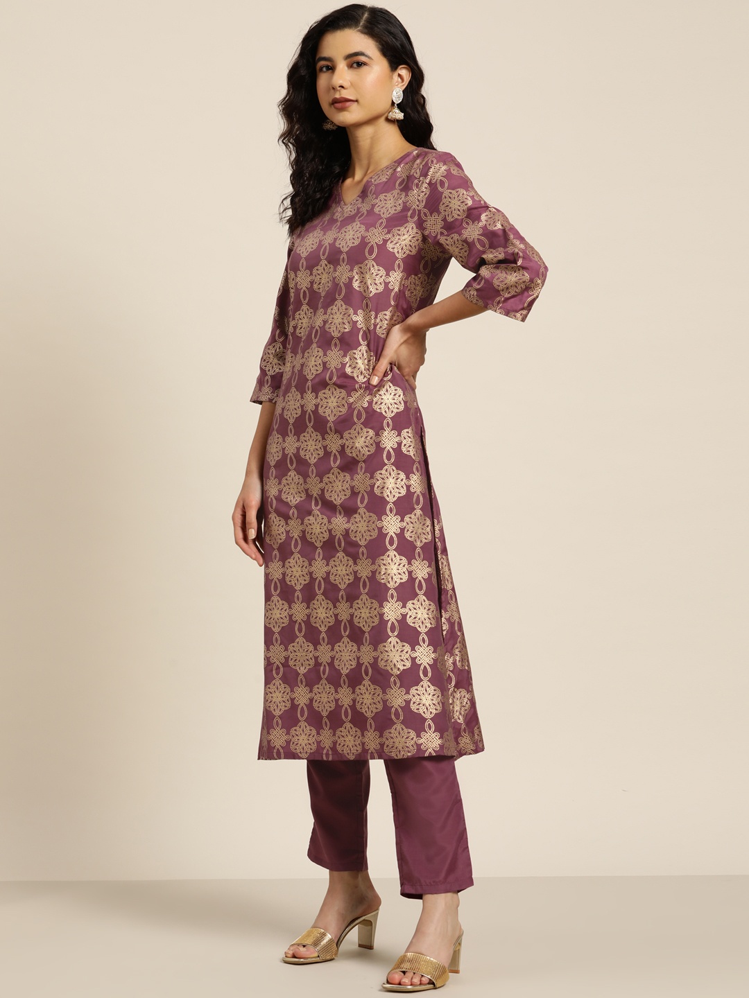 

Moda Rapido Women Mauve & Golden Printed Kurta with Trousers