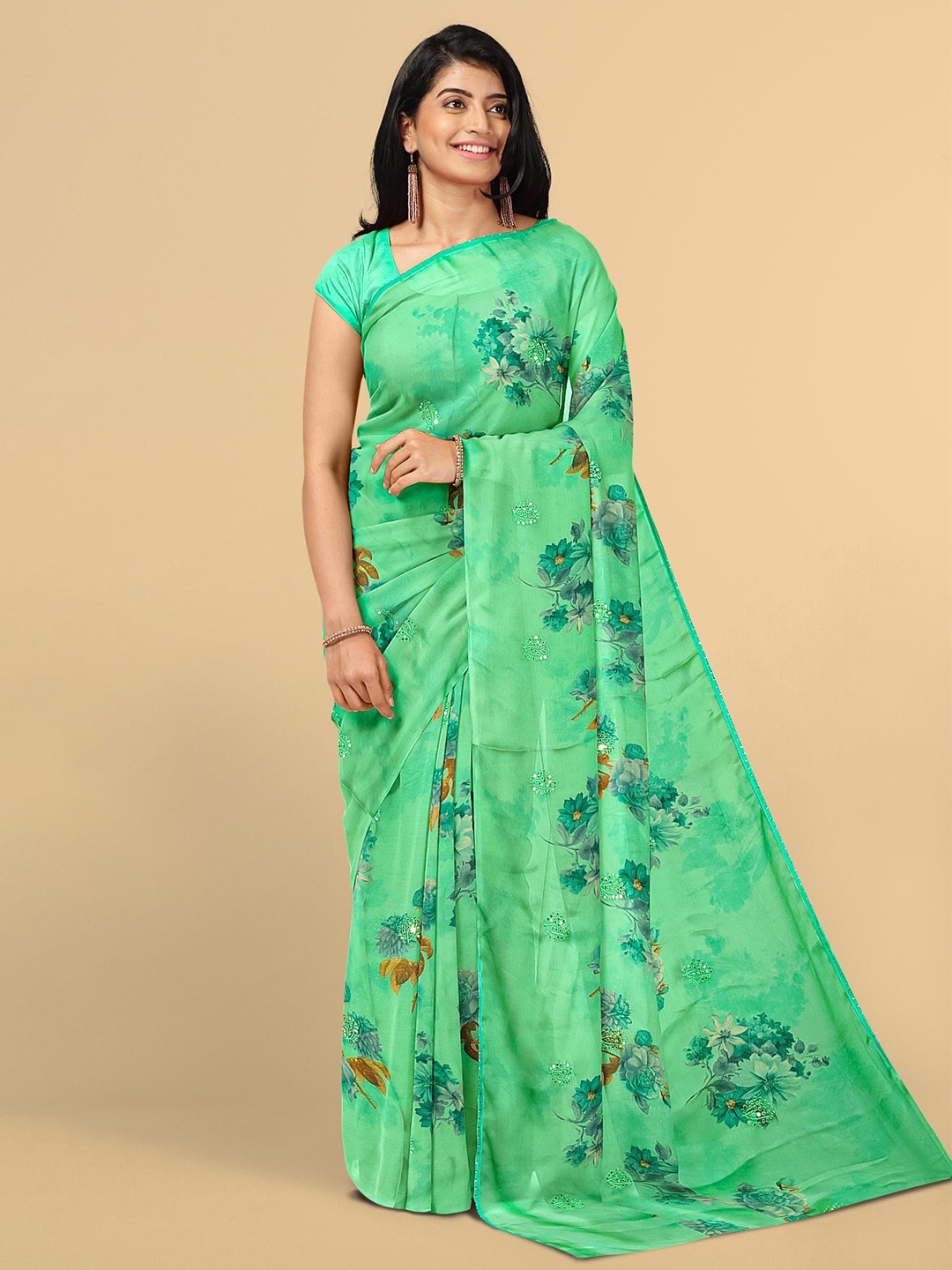 

Kalamandir Women Sea Green & Brown Floral Printed Silk Blend Saree