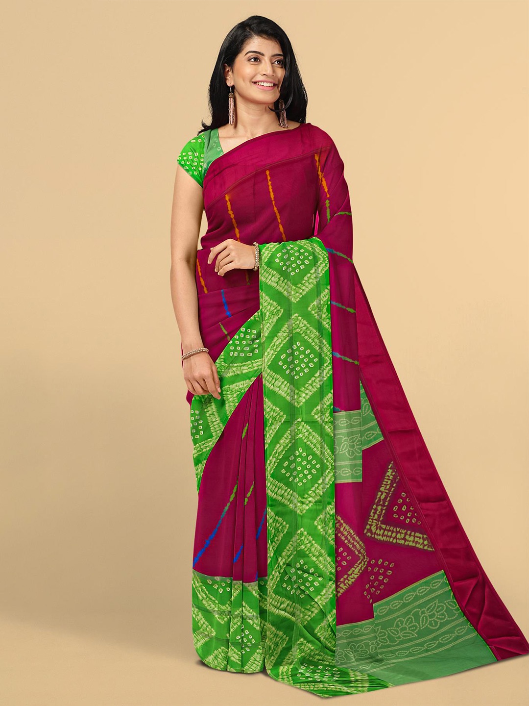 

Kalamandir Pink & Green Ethnic Motifs Saree