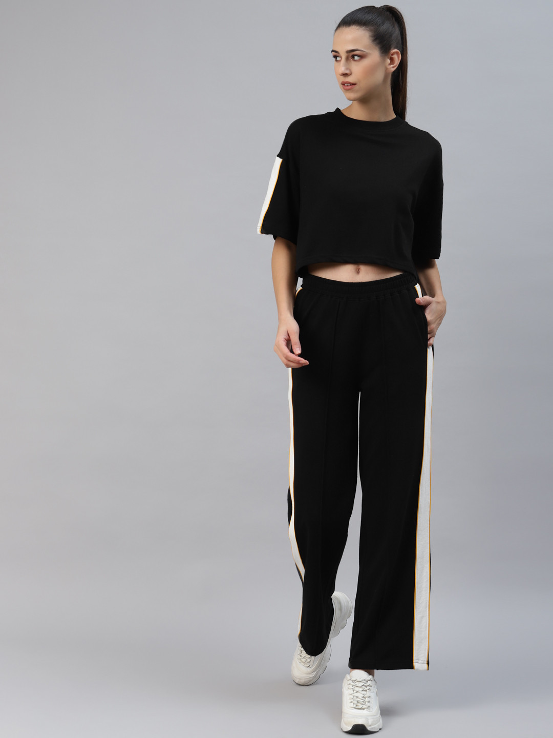 

Laabha Women Black Solid Tracksuit