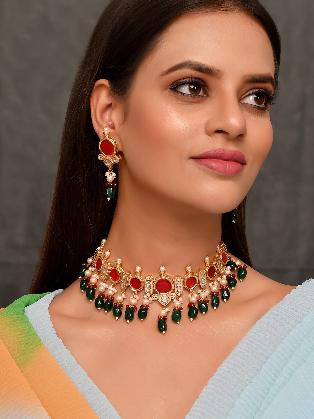 

DASTOOR Women Gold-Plated Red Kundan Studded Jewellery Set