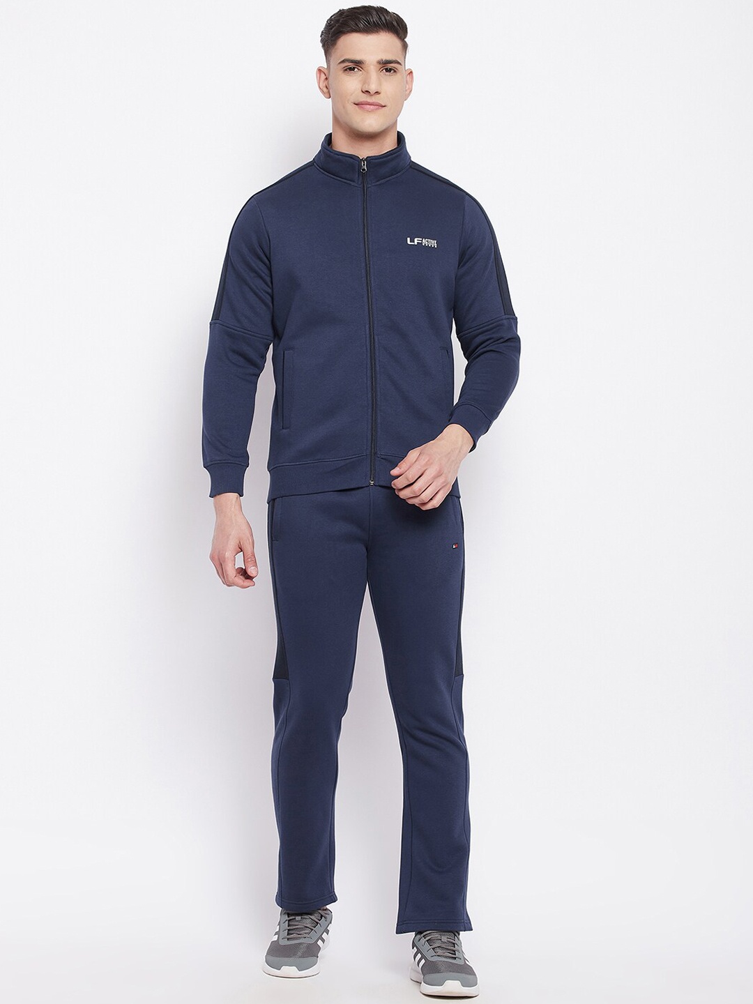 

NEVA Men Blue Solid Mock Collar Long Sleeves Tracksuits