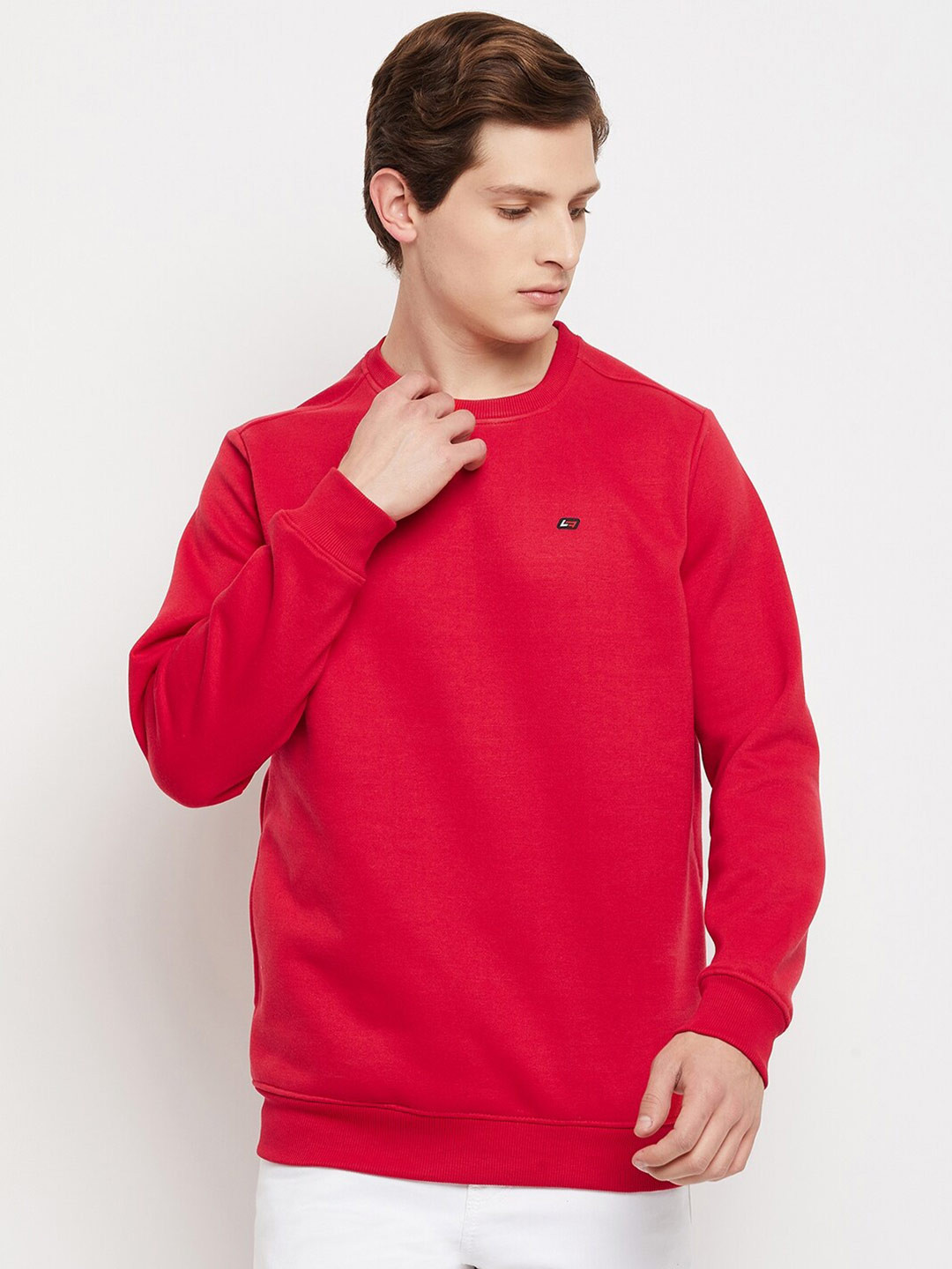 

NEVA Men Red Solid Sweatshirt