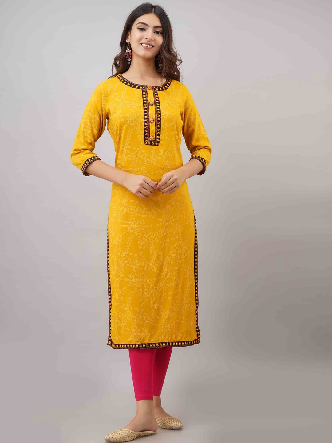 

KALINI Women Yellow Geometric Printed Mirror Work Kurta