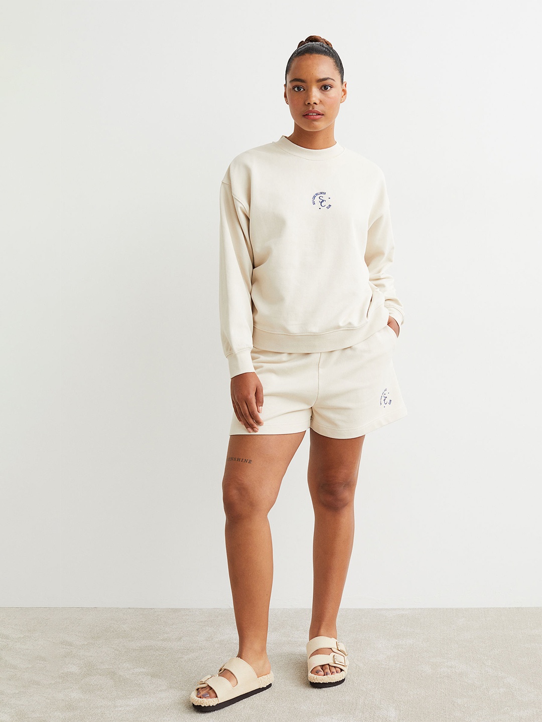 

H&M Women Beige Printed sweatshirt