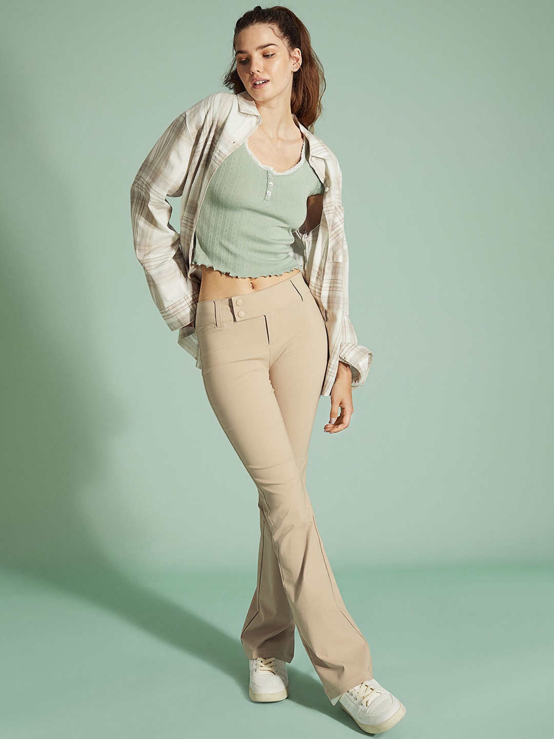 

H&M Women Beige Flared Trousers