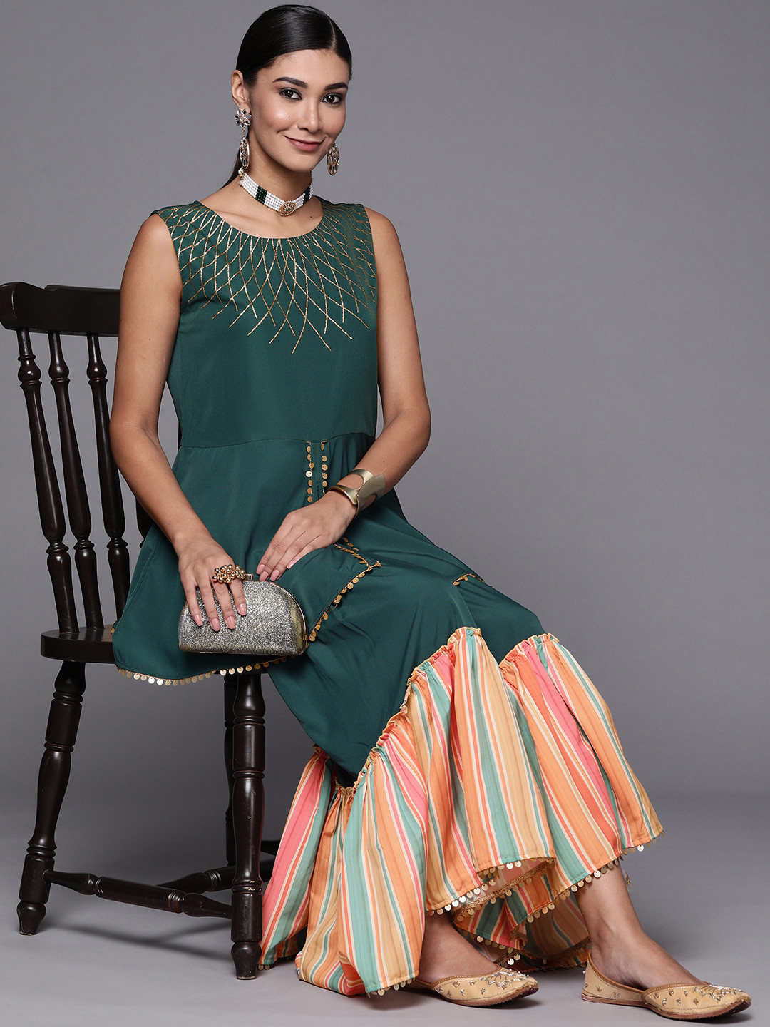 

Ahalyaa Women Teal Green Yoke Design High Slit Sequinned Kurti with Sharara