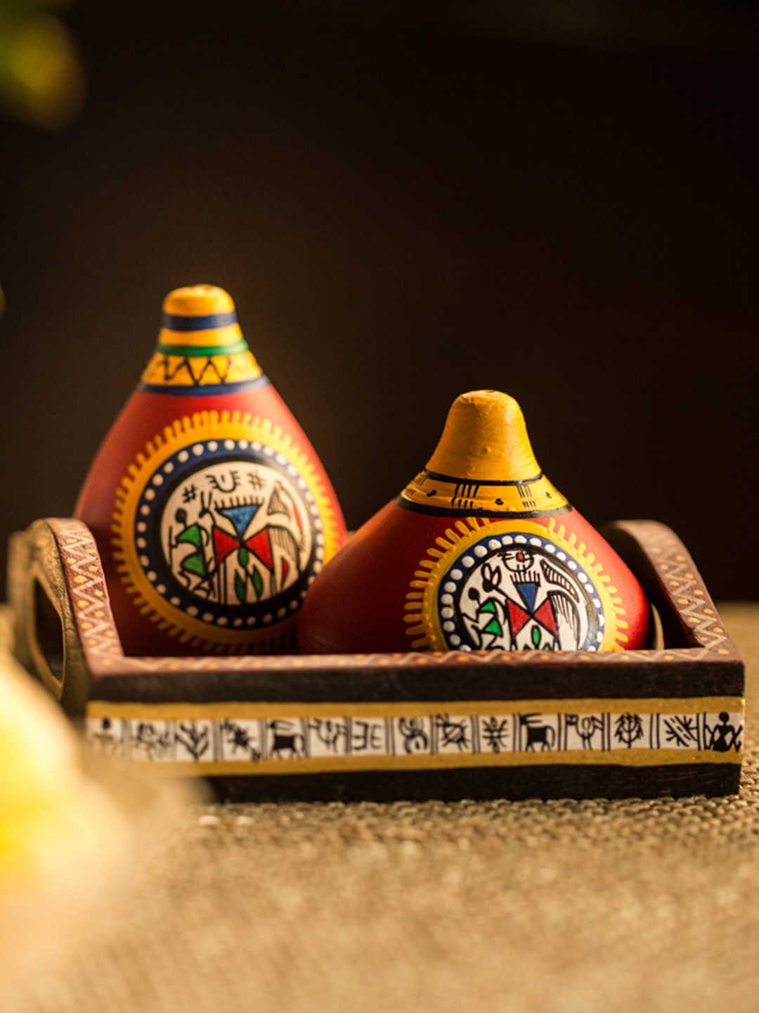 

ExclusiveLane Terracotta Warli Hand-Painted Salt Pepper Shaker With Wooden Tray, Red